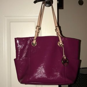 Berry colored medium size Michael Kors tote
